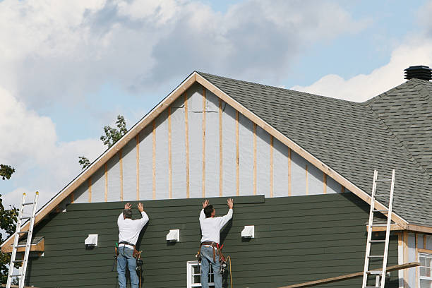 Professional Siding Installation technician working in Waldo, FL